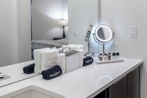 Shower, hair dryer, towels