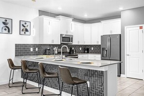 Fridge, microwave, oven, stovetop - Newly Furnished 9BR Villa/Steps from Clubhouse (Four Corners)