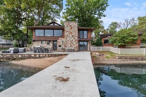 Exterior - New! Luxurious FLAT lot with private beach, dock, guest suite/apartment. (Lake Ozark)