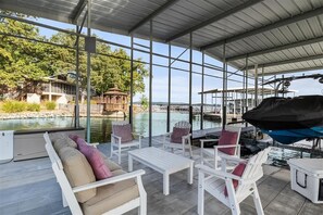 Terrace/patio - New! Luxurious FLAT lot with private beach, dock, guest suite/apartment. (Lake Ozark)