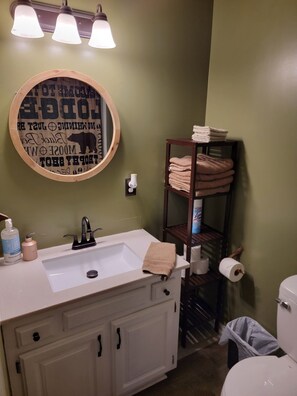 Combined shower/tub, towels, soap