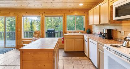 Dog-friendly hillside home with Peek a Boo Lake Views! Great trails nearby. BBQ grill provided.
