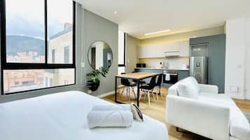 Premium bedding, blackout curtains, iron/ironing board, free WiFi