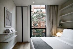 Apartment, 2 Bedrooms (201) | Premium bedding, blackout drapes, iron/ironing board, free WiFi - Kubik Apartments in Exclusive Virrey by Wynwood-House (Bogotá)