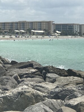On the beach, sun-loungers