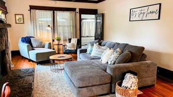 TV, fireplace, books