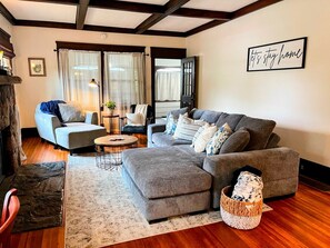 TV, fireplace, books