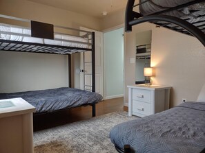 9 bedrooms, desk, blackout drapes, iron/ironing board