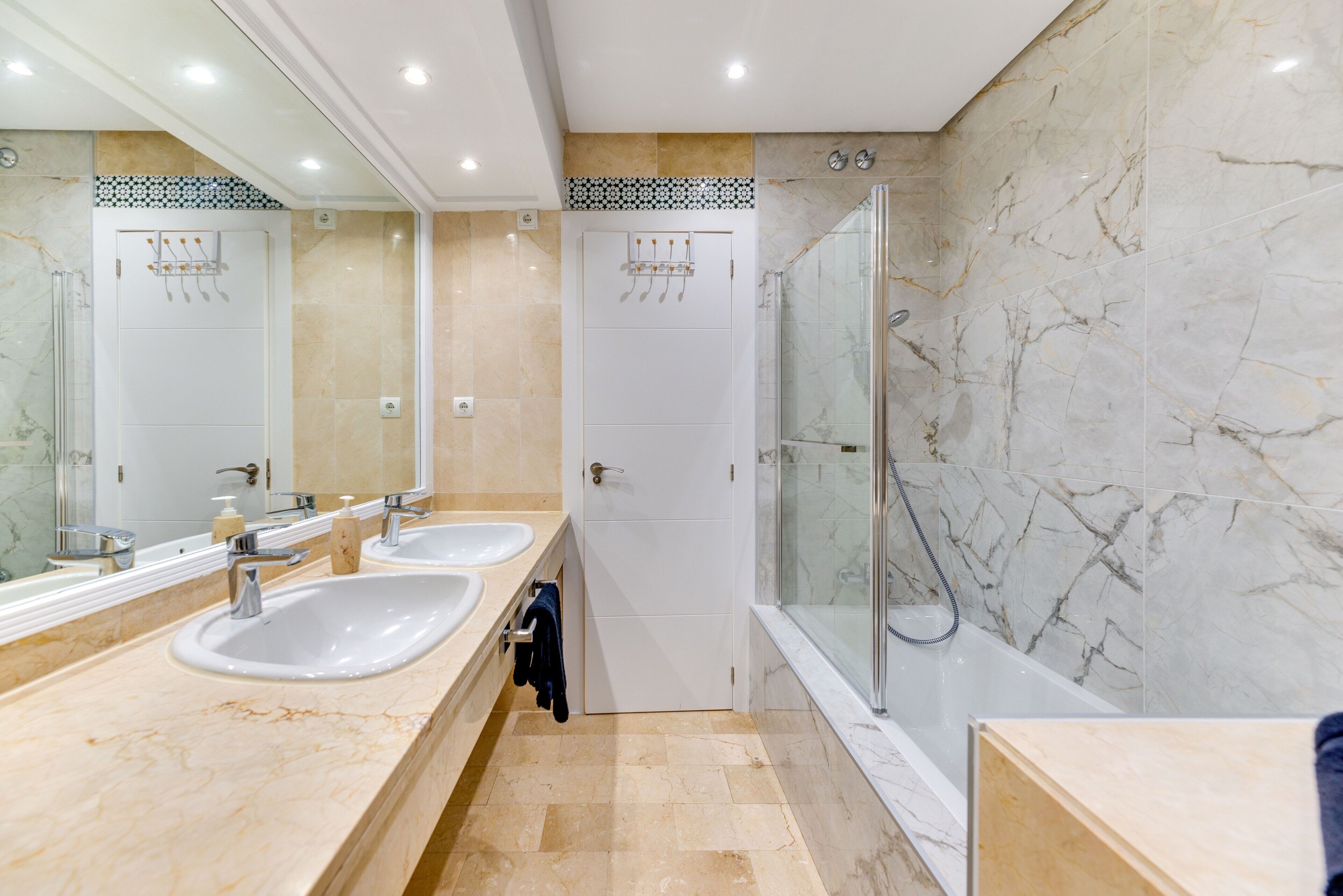 Bathtub, hair dryer, towels