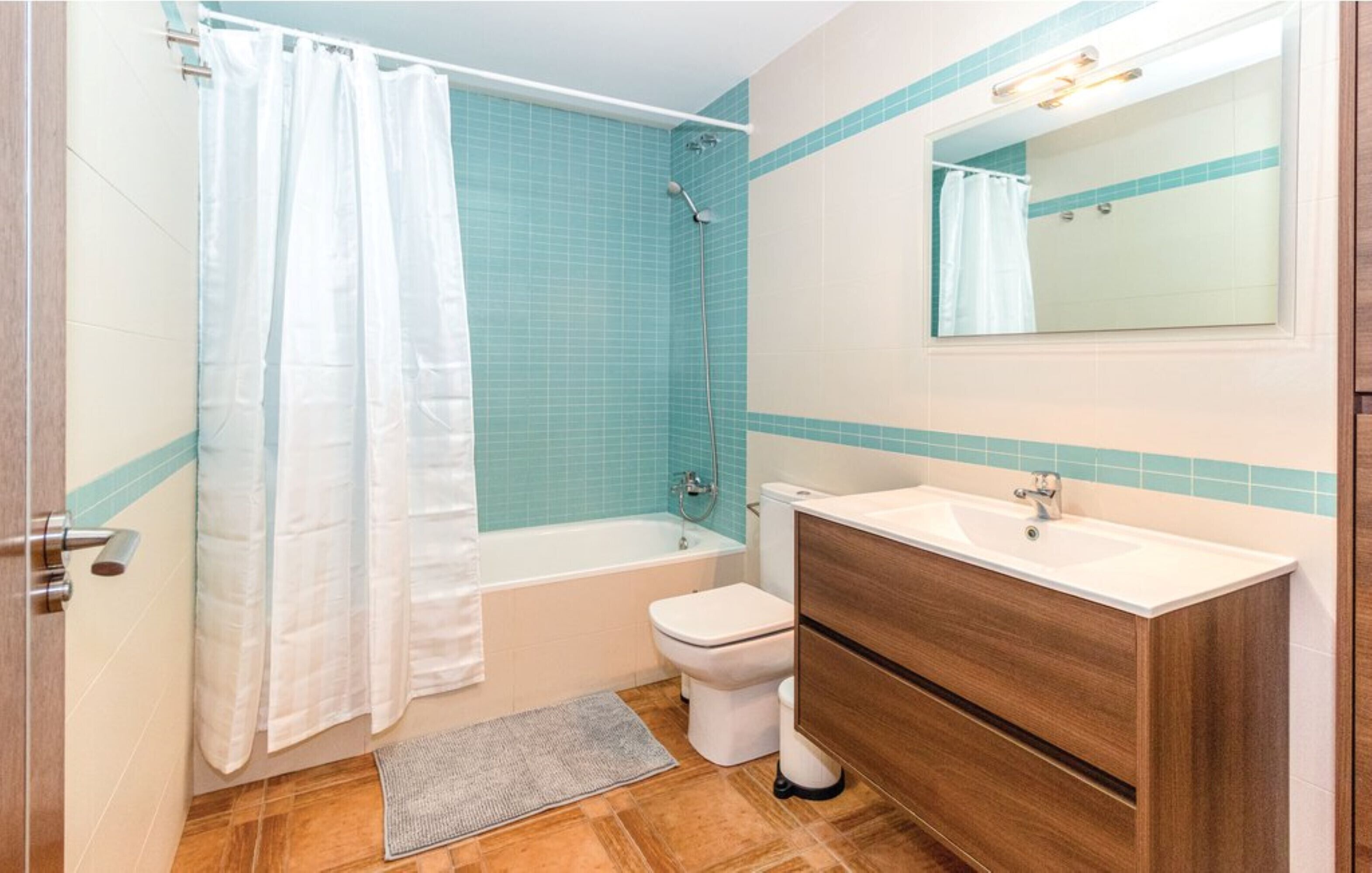 Bañera y toallas