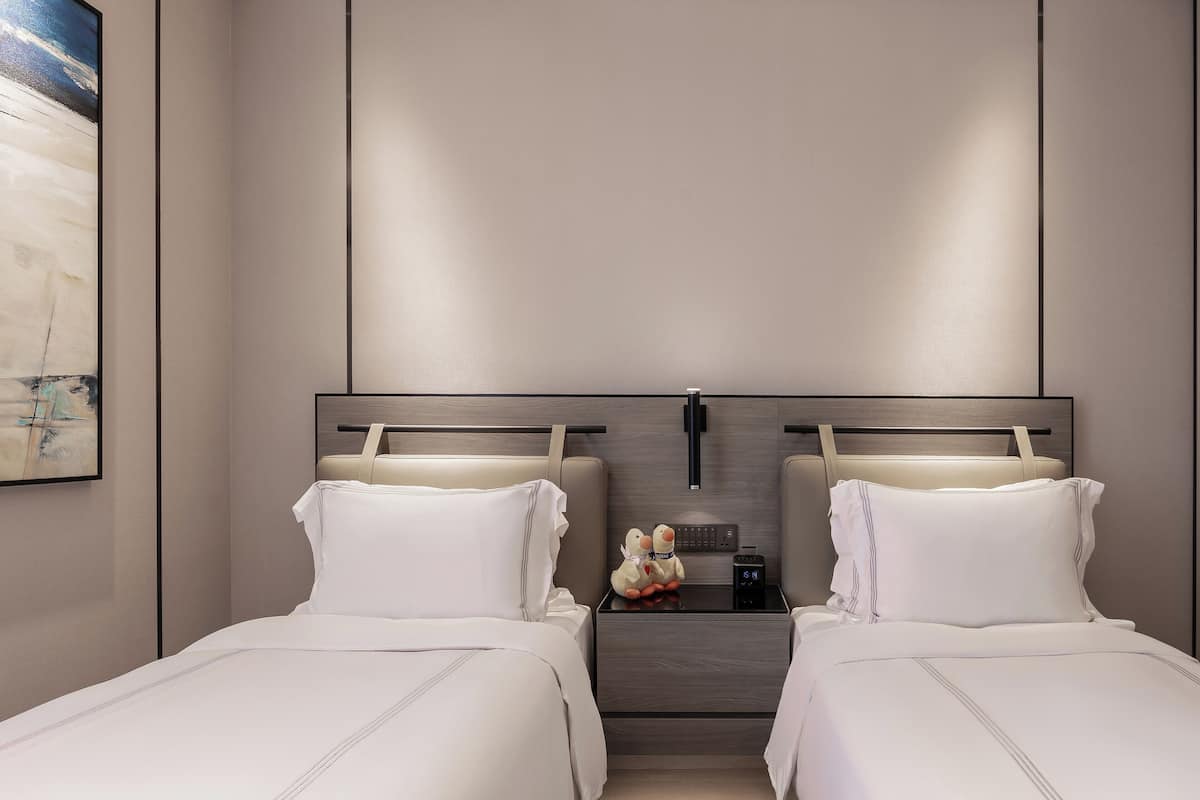 Deluxe Room, 2 Bedrooms | In-room safe, desk, laptop workspace, blackout drapes