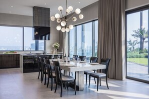 Penthouse | Private kitchen | Full-size fridge, microwave, coffee/tea maker, electric kettle