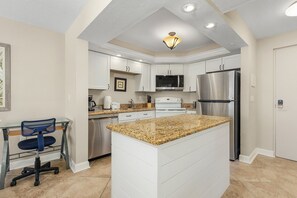 Fridge, microwave, oven, stovetop - Beachfront Paradise: Views, Pool, Walk to Times Sq (Fort Myers Beach)