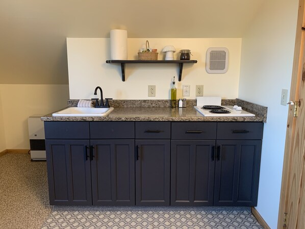 Fridge, microwave, stovetop, coffee/tea maker