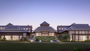 A traditional-style building with multiple levels and a central courtyard. - Courtyard by Marriott Liuzhou Sanjiang (Liuzhou)