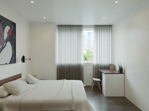 Deluxe appartement, 2 slaapkamers | Luxe beddengoed, bedden met traagschuimmatrassen, een minibar