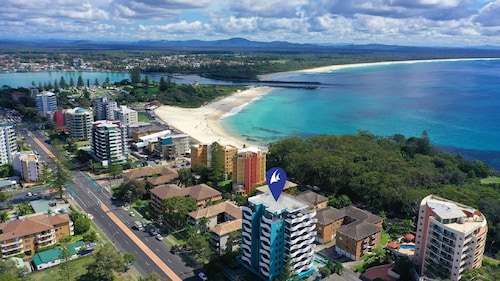 Shores 501. Located on 5th floor and central to two beaches, local shops and restaurants.