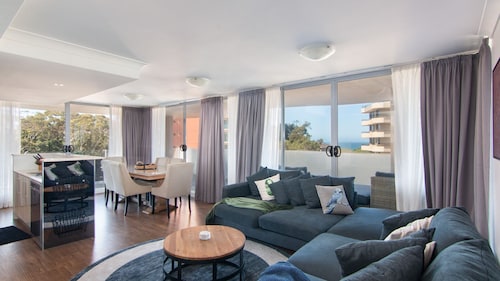 Shores 501. Located on 5th floor and central to two beaches, local shops and restaurants.