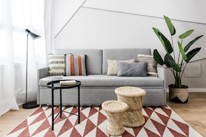 Apartamento, 1 cama de casal e sofá-cama | Área de estar | TV