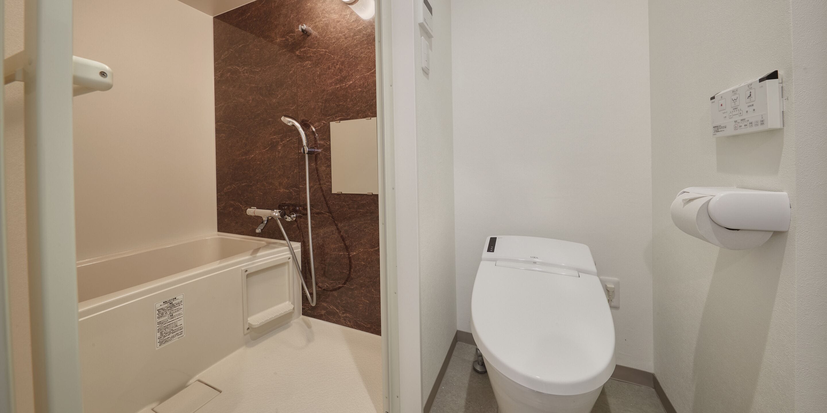 separate bathtub and shower, free toiletries, hair dryer, slippers