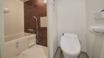 Separate tub and shower, free toiletries, hair dryer, slippers