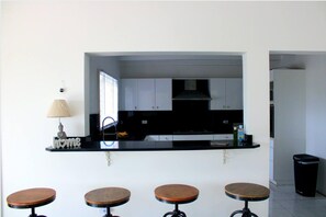 Villa | Private kitchen | Fridge, microwave, oven, stovetop - Tropical Ivy - a Peaceful Getaway in St Maarten (Philipsburg)