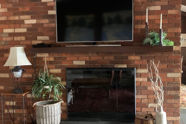 Wood burning fireplace and smart TV