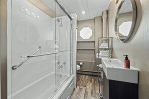 Bathtub, hair dryer, towels