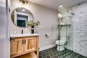 Bathtub, hair dryer, towels