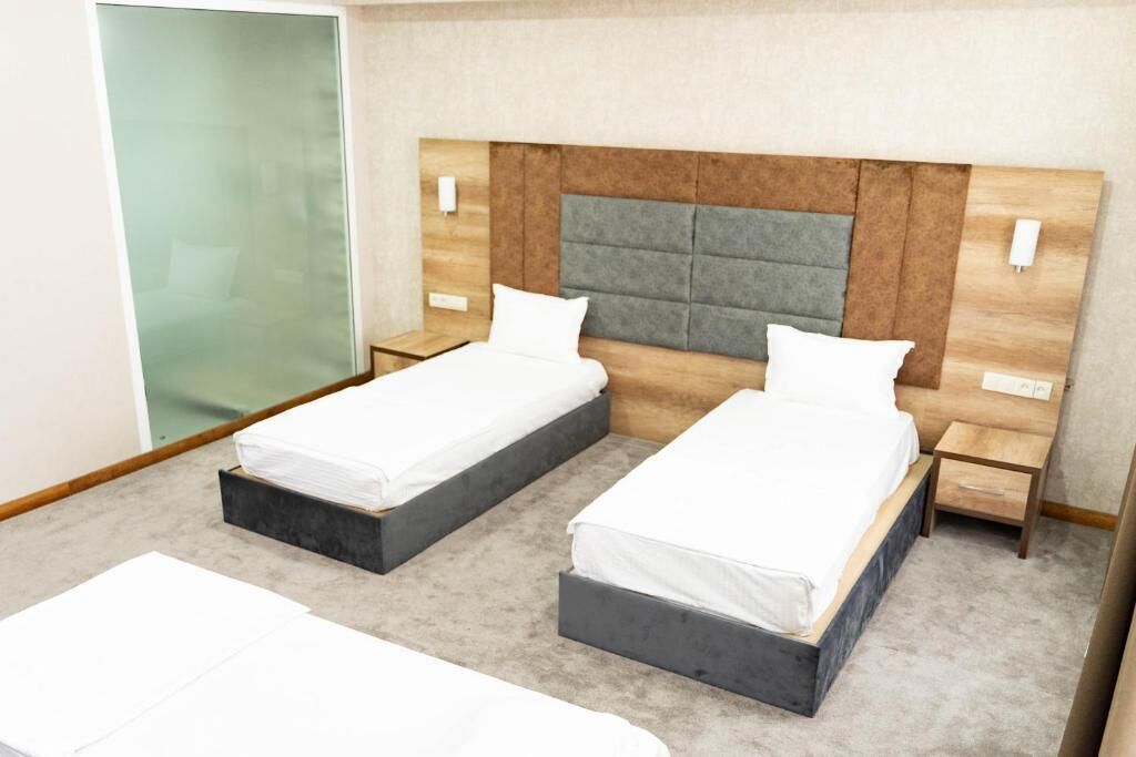 Premium bedding, down duvets, free minibar items, in-room safe