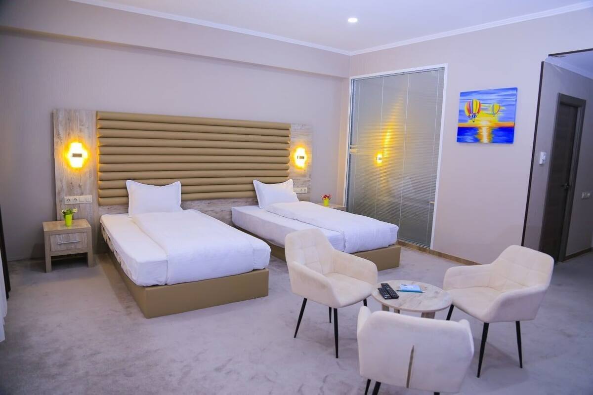 Premium bedding, down comforters, minibar (some free items)