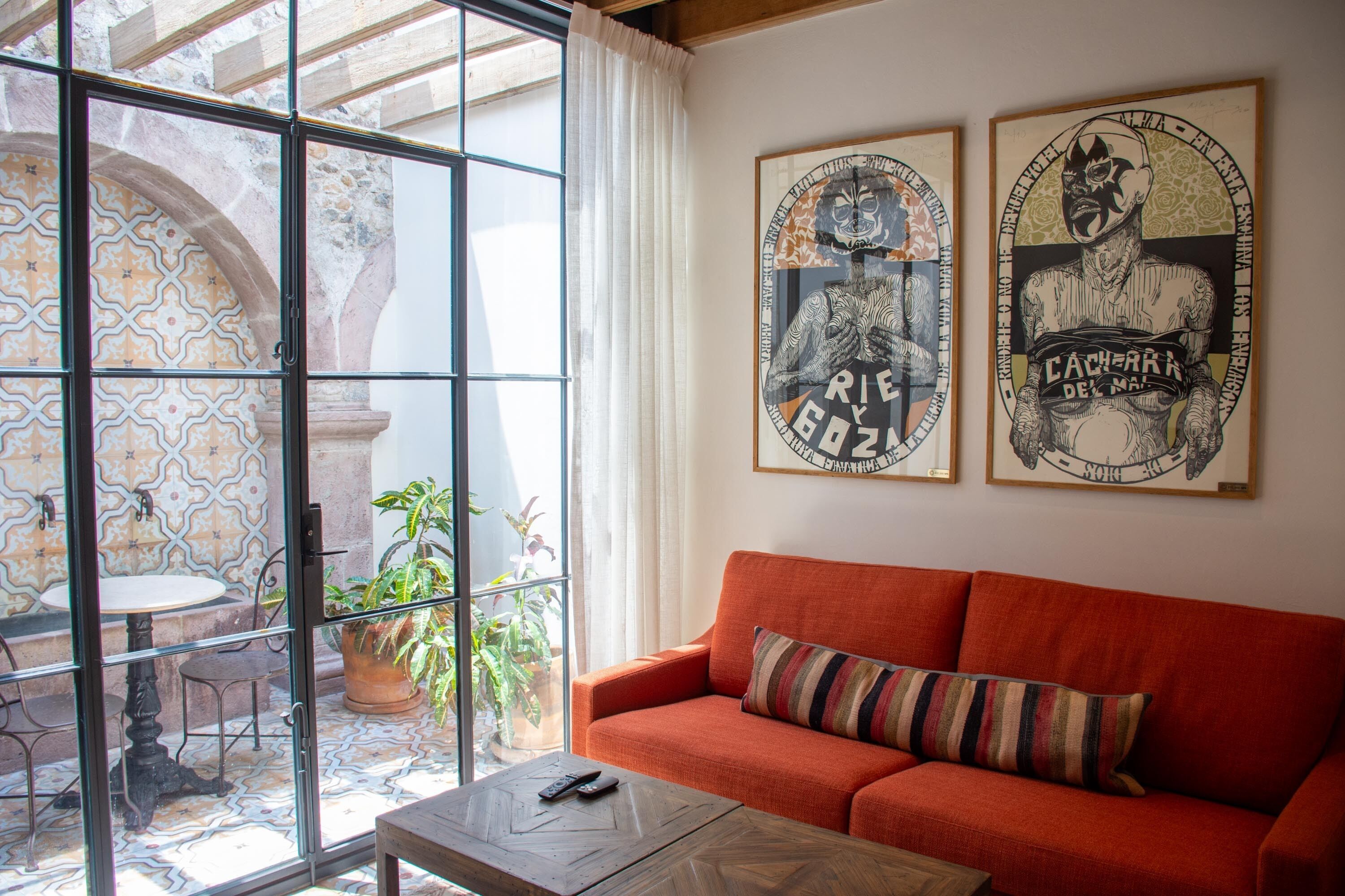 presidential studio suite | living area | 55-inch tv with digital channels, ipod dock, streaming services