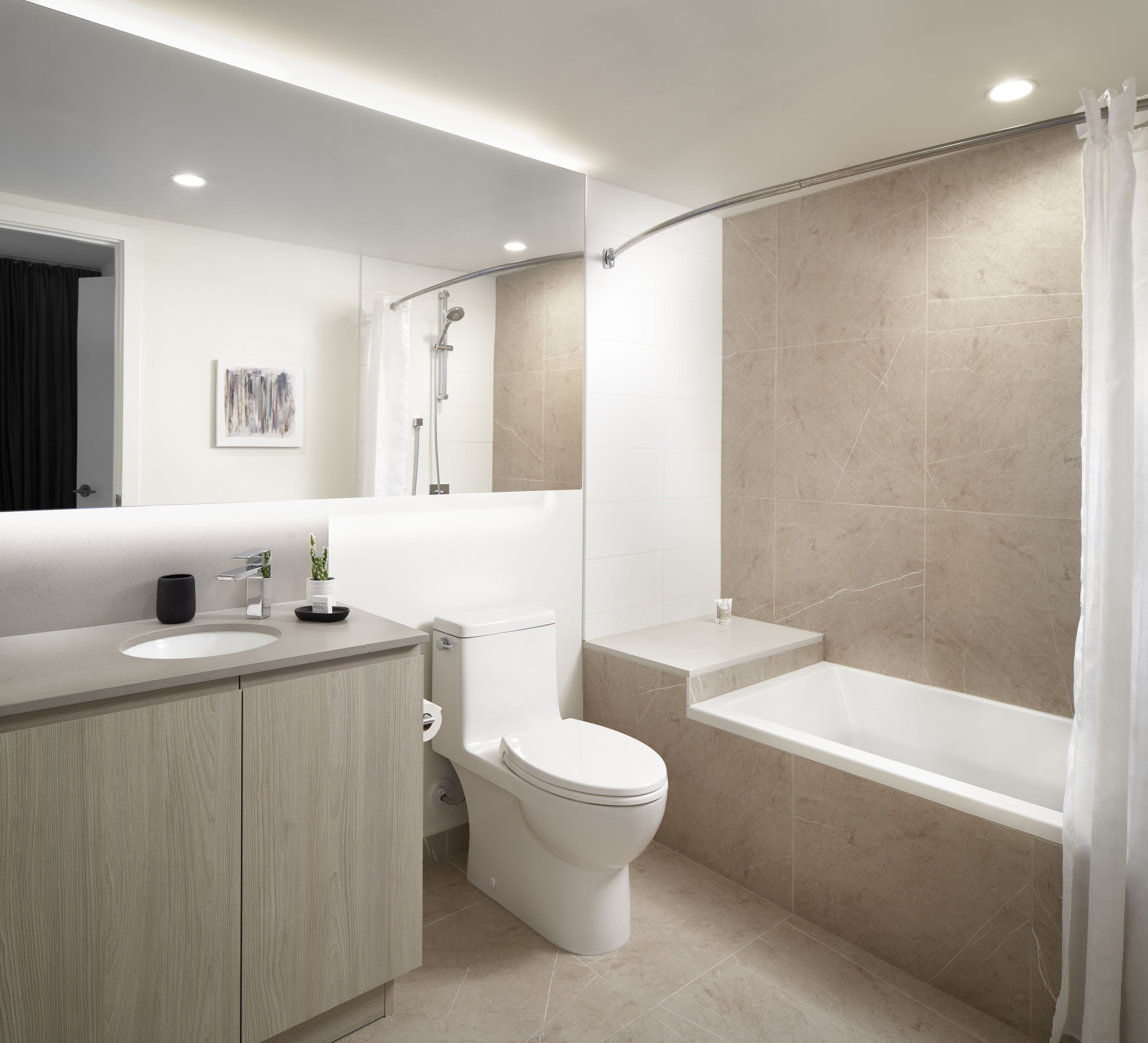 combined shower/bathtub, hair dryer, bathrobes, towels