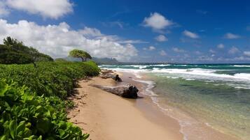 On the beach, sun-loungers, beach towels