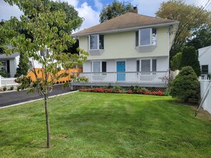 Exterior - Serene upstairs apt. Walk to town, train, & beach ferry! Off-street parking. (Greenwich)