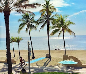 On the beach, sun-loungers, beach towels