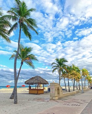 On the beach, sun-loungers, beach towels