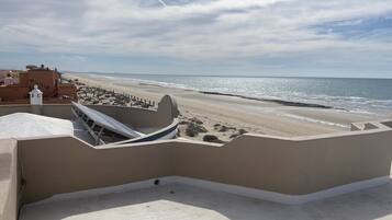 Enjoy breathtaking views of the beach from our rooftop terrace.