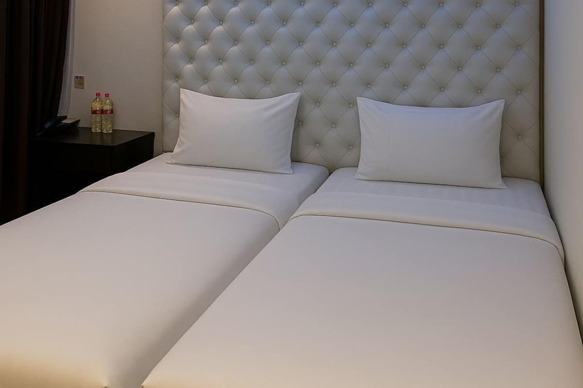 Standard-Zweibettzimmer, 2 Einzelbetten | Kostenloses WLAN, Bettwäsche