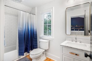 Combined shower/tub, hair dryer, towels, soap