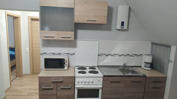 Microwave, coffee/tea maker, cookware/dishes/utensils