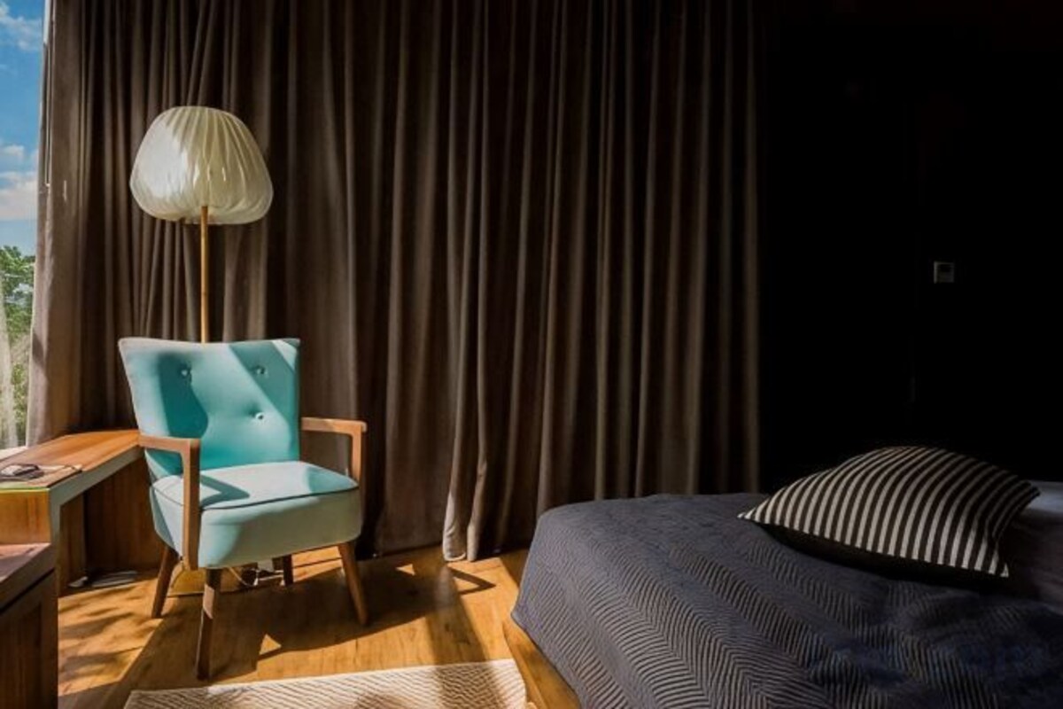 Premium bedding, down comforters, memory foam beds, in-room safe