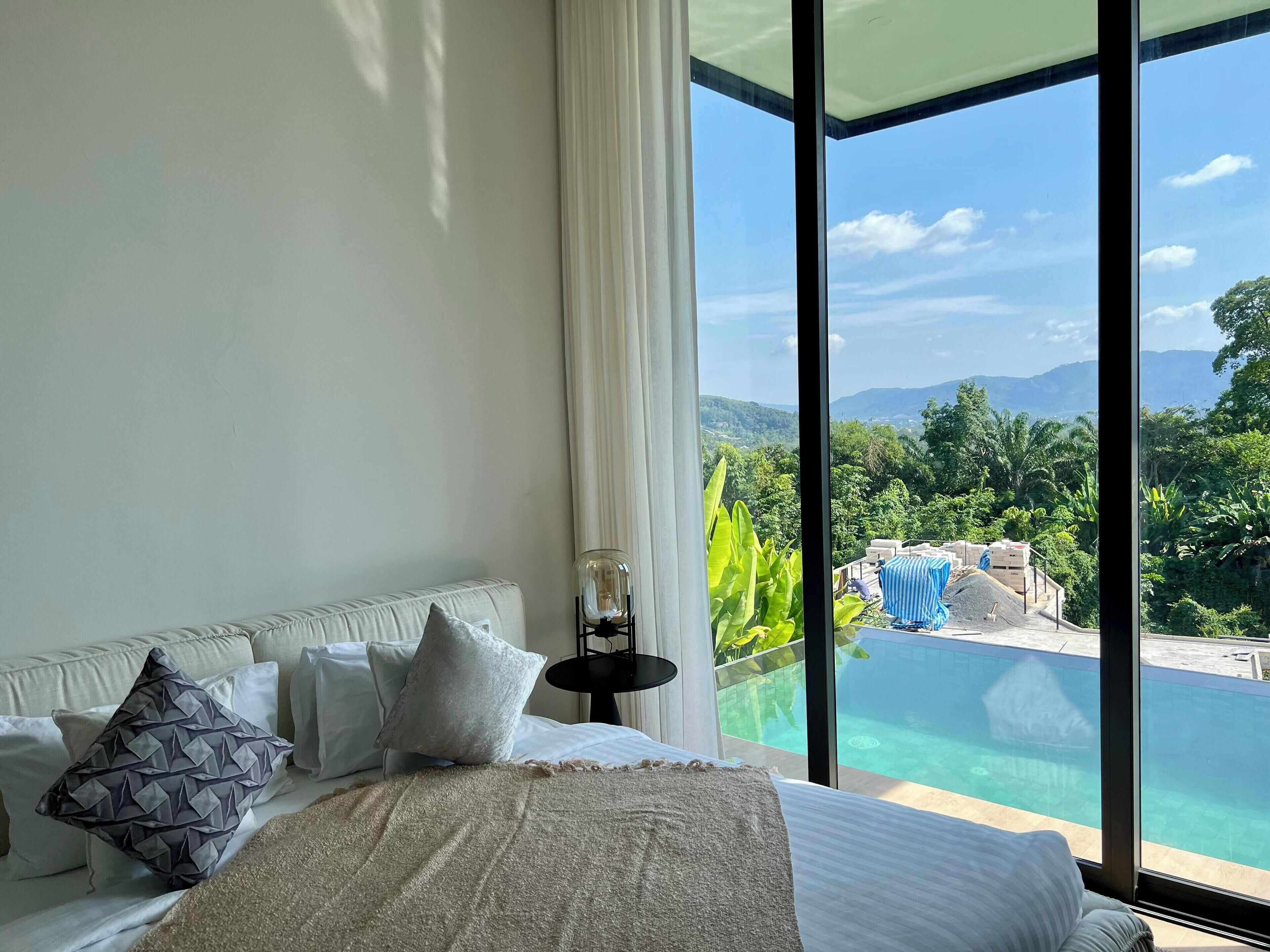 Premium bedding, down duvets, memory-foam beds, in-room safe