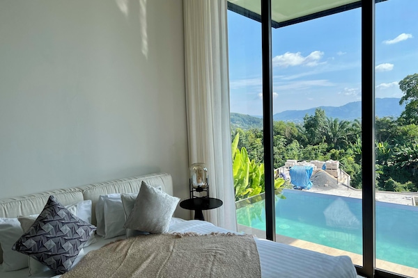 Premium bedding, down duvets, memory-foam beds, in-room safe