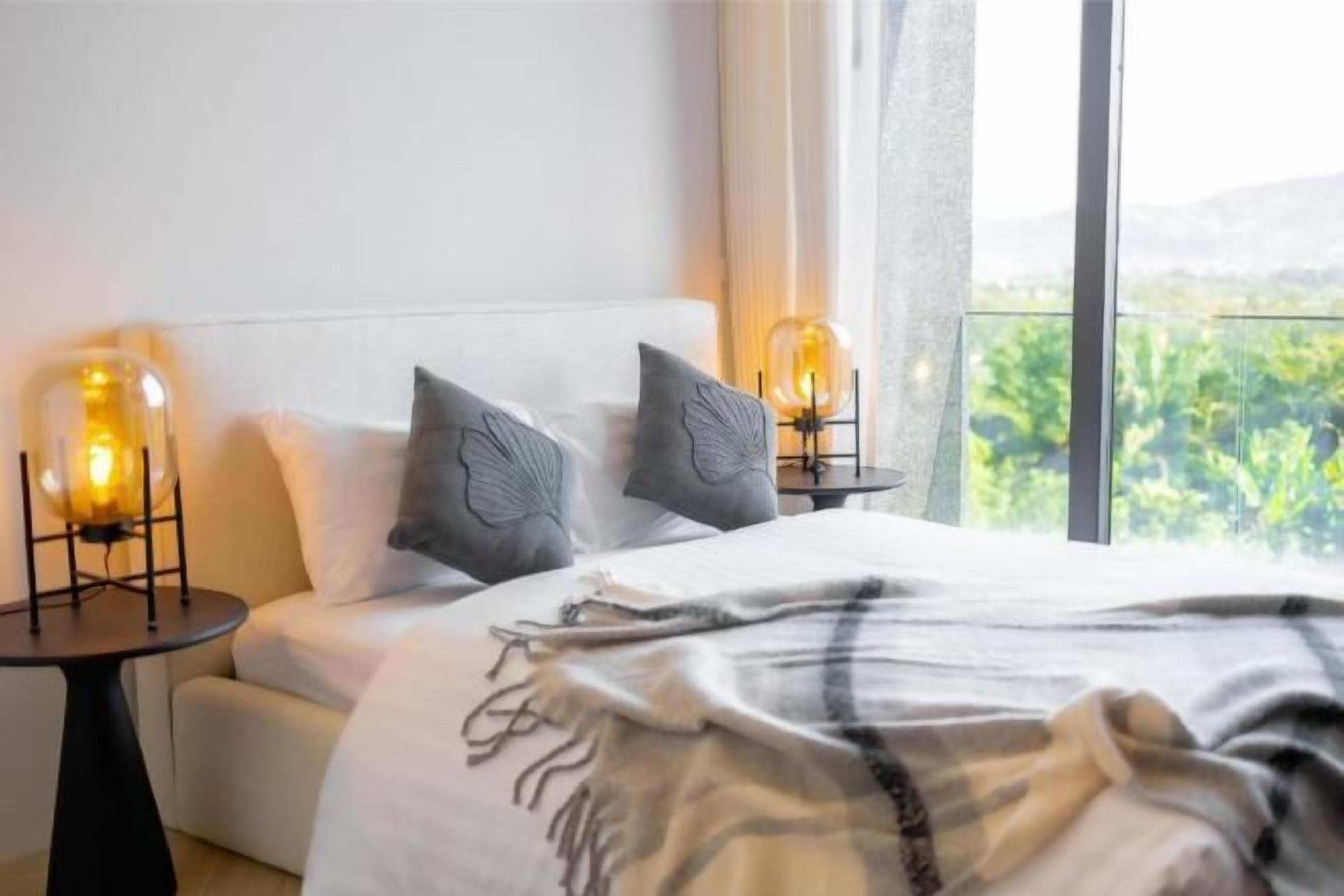 Premium bedding, down duvets, memory-foam beds, in-room safe