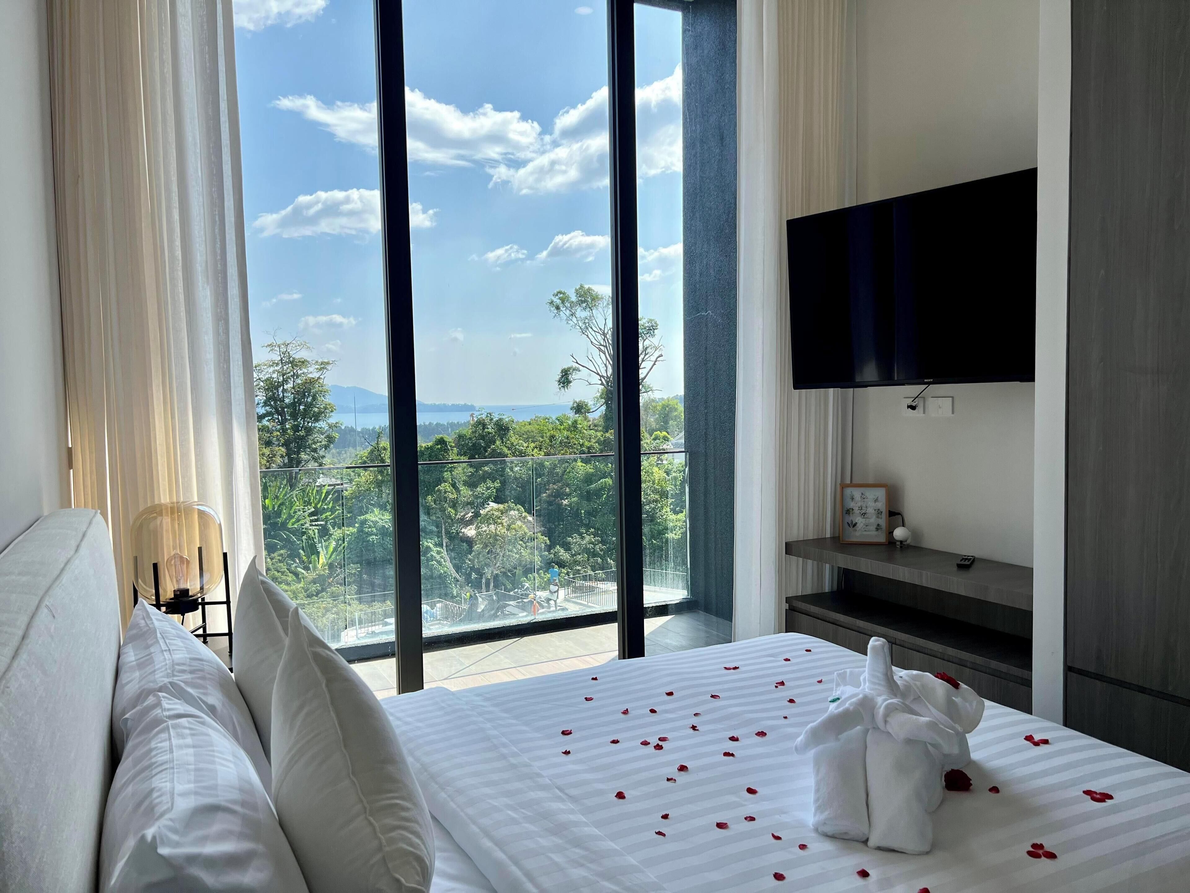 Premium bedding, down duvets, memory-foam beds, in-room safe