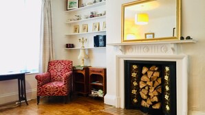 Apartment | Living area | 30-inch TV with cable channels - Entire Cottage Style Flat in Heart of Wallingford (Wallingford)