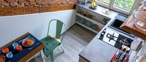 Deluxe Apartment, 1 Bedroom | Private kitchen | Fridge, microwave, stovetop, toaster