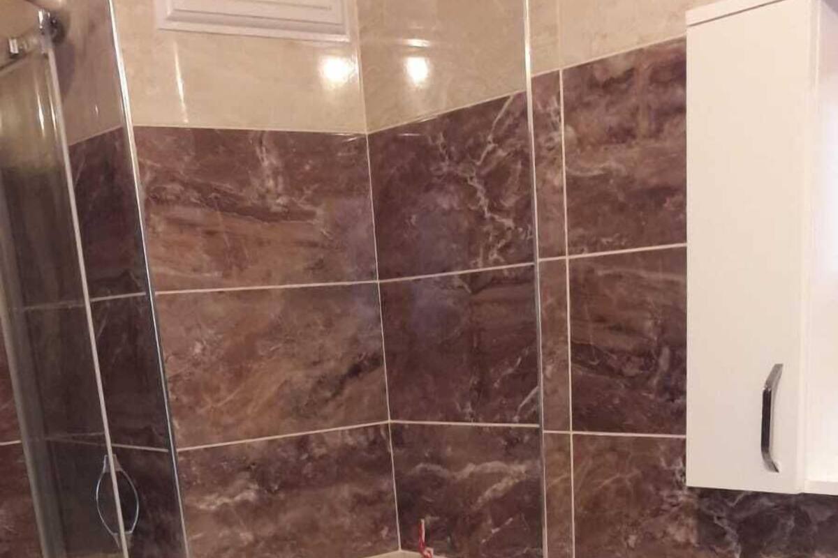Shower, shampoo, toilet paper