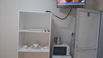 Muebles diferentes, tabla de planchar con plancha y wifi gratis